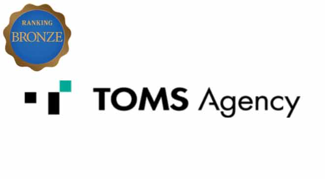 株式会社トムスエージェンシーロゴ_BRONZE